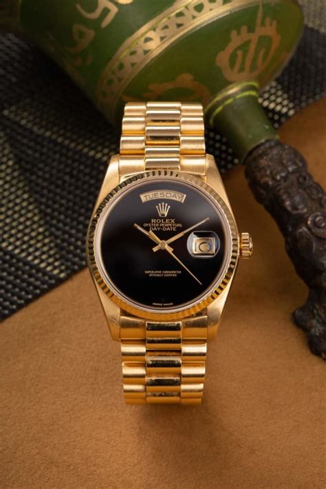 rolex day date yellow gold blue dial|rolex day date onyx dial.